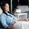 Woman experiencing no iron infusion side effects while relaxing during IV session