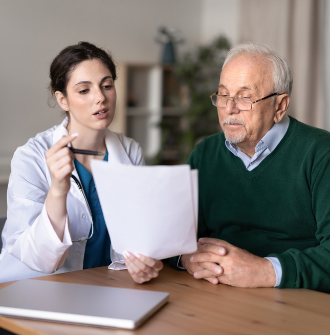 Adult Medical & Wellness Services provider reviewing health information with a patient